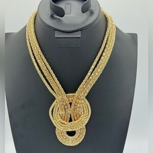 Knotted Gold Tone necklace, clasp with an extender